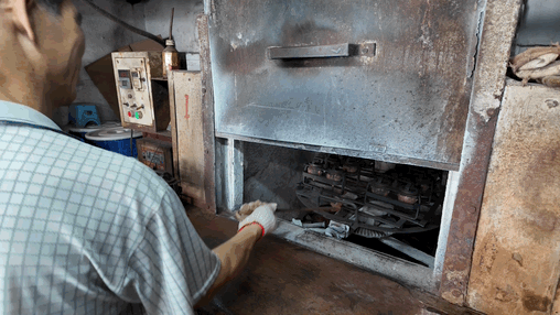 Remove the mold from the oven and cool it with water