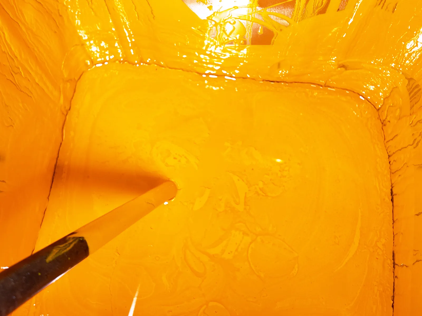 Prepared bright yellow PVC paste.