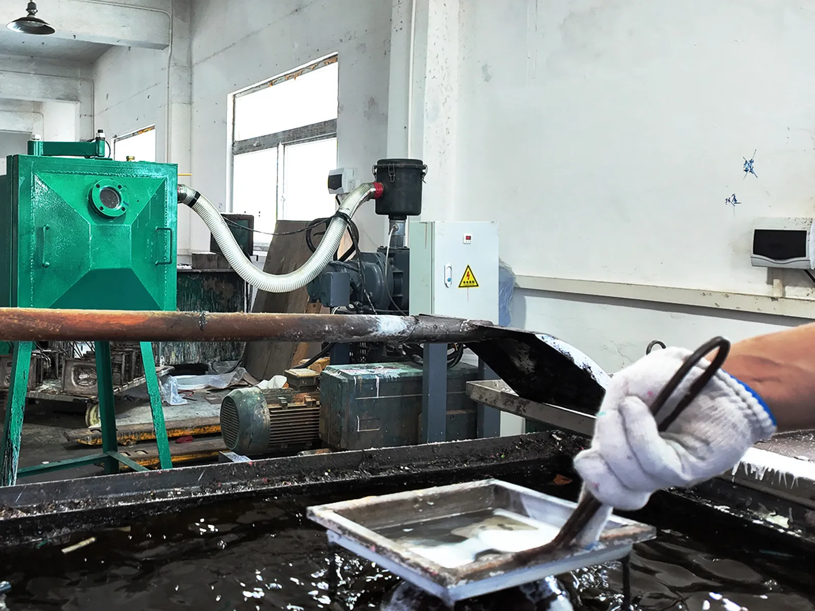Vinyl figure components are undergoing thermoforming at the work site of a toy factory