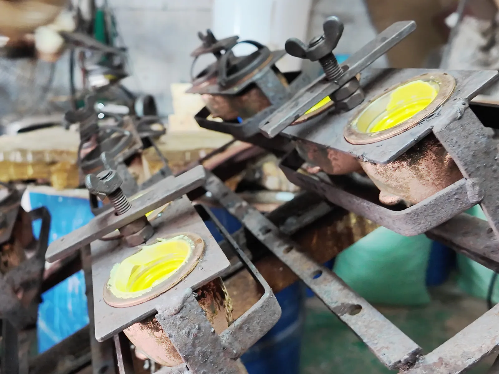 During vinyl toy production, preparing to take toy parts out of the oven